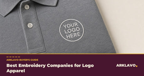 Best embroidery companies for logo apparel buyer's guide: a close-up of a grey polo with an embroidered Your Logo Here left-chest badge