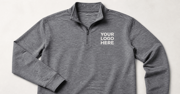 how to choose quarter zips for staff uniforms: grey quarter zip with a left-chest logo placeholder