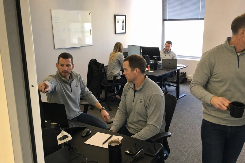 Customer team wearing Arklavo apparel