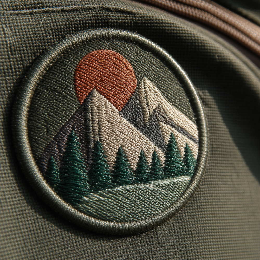 Close-up of an embroidered logo on a backpack