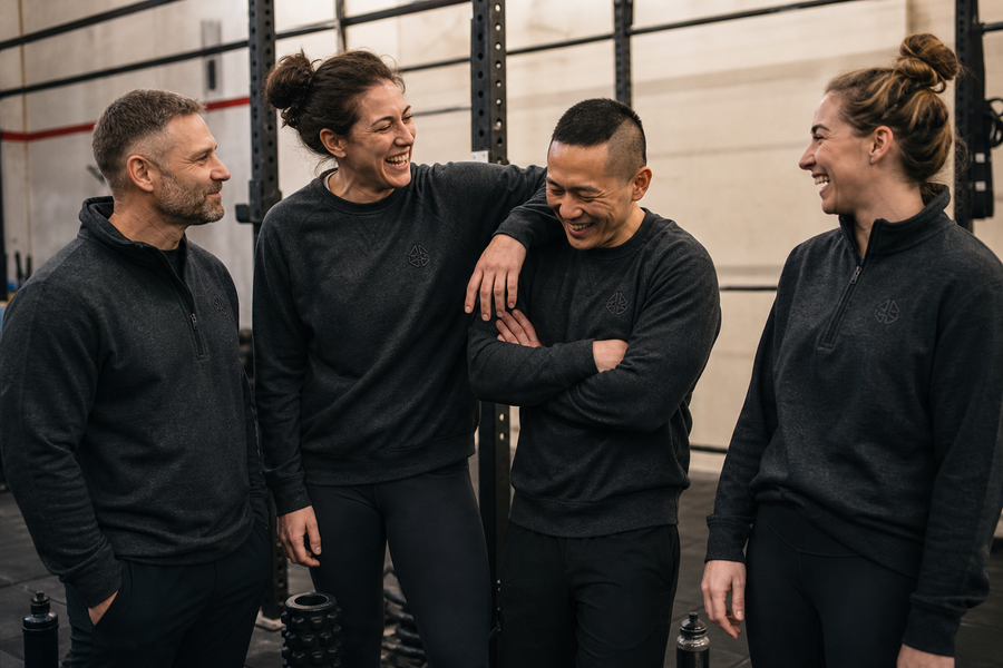 A gym coaching team in matching custom embroidered sweatshirts
